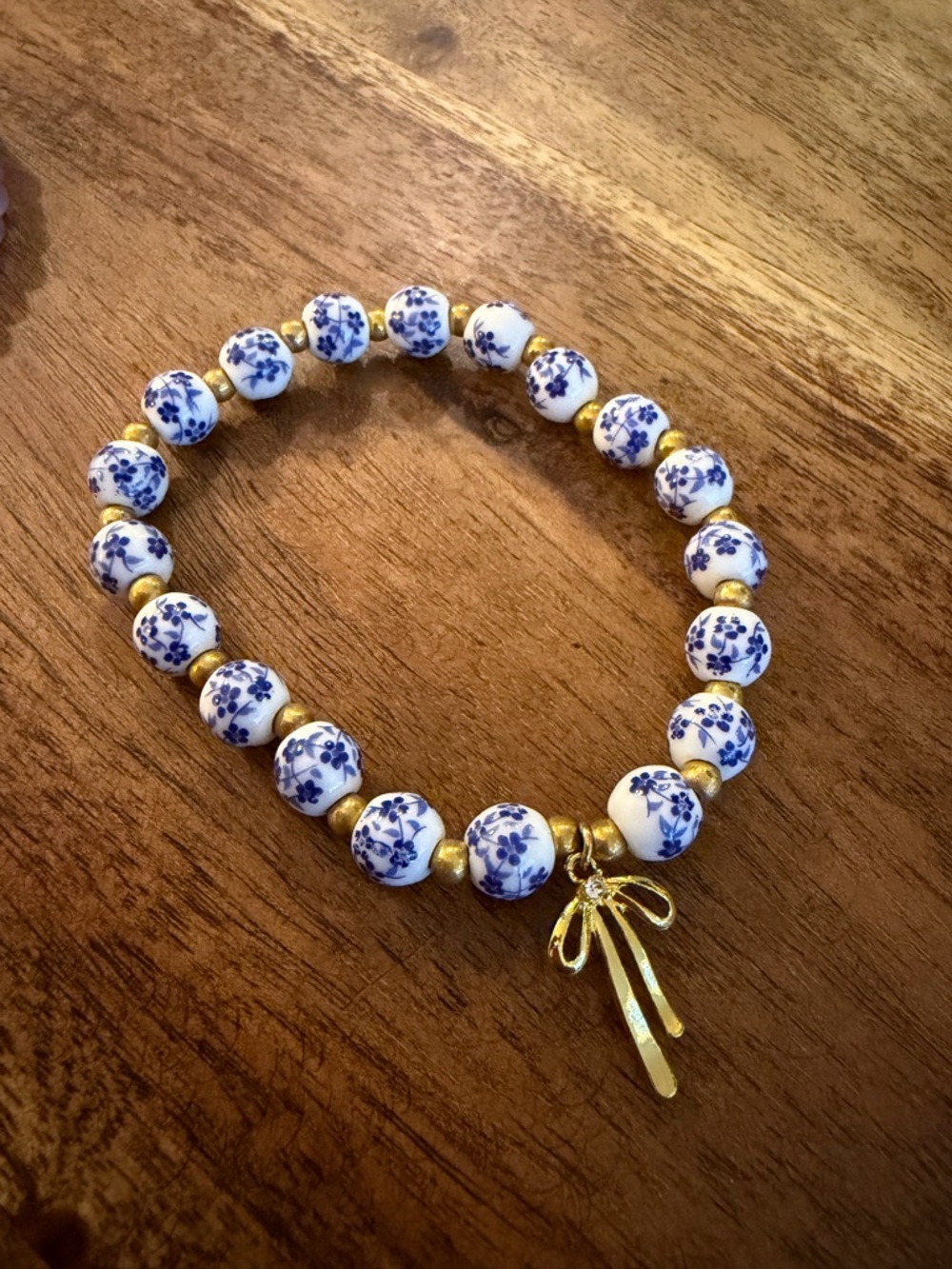 Elegant Purple Beaded Bracelet with Gold Charm